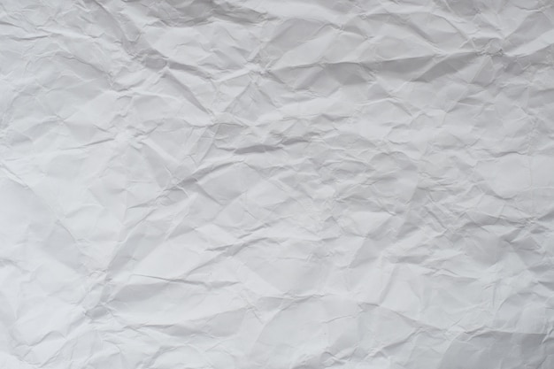 Foto textura de papel fondo de papel arrugado blanco.