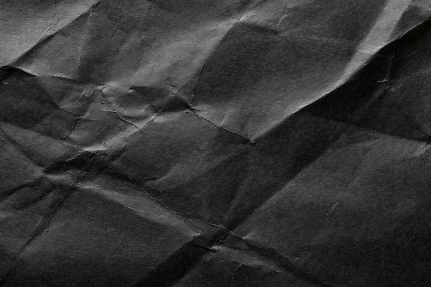 Foto textura de papel negro arrugado