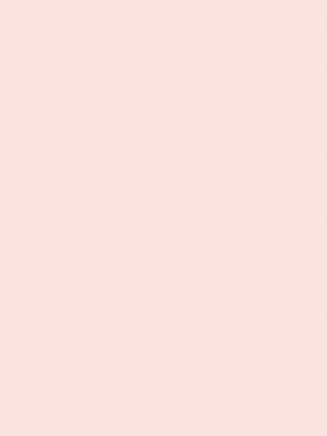 Foto textura de papel rosa brumoso vertical con motas de ruido