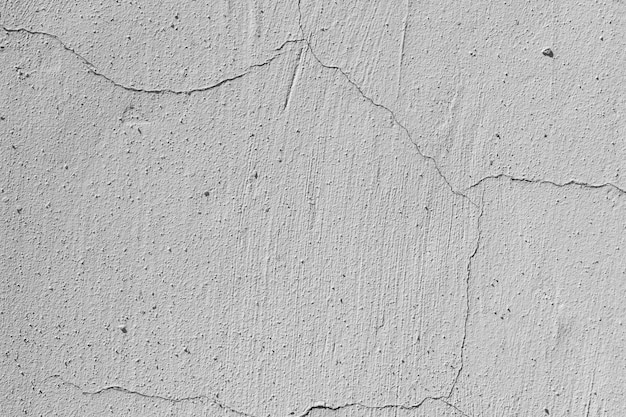 Textura de pared blanca agrietada Pintura blanca fondo negro agrietado Textura de líneas rayadas Muro de hormigón grunge blanco y negro de cerca