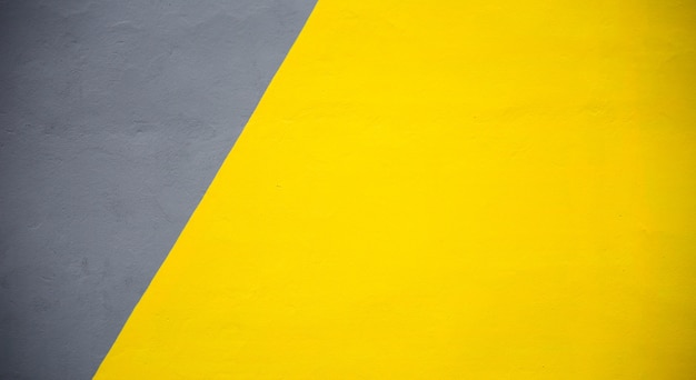 Textura de pared de cemento amarillo y gris