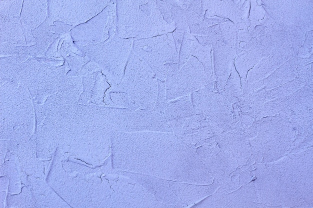 Textura de pared de cemento blanco con grietas.