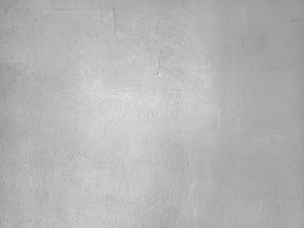 Foto textura de la pared de cemento pintada de blanco fondo sin costura