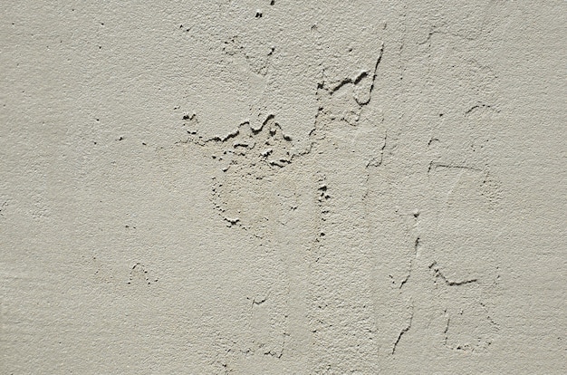 La textura de la pared, cubierta con placas de poliestireno de espuma gris.