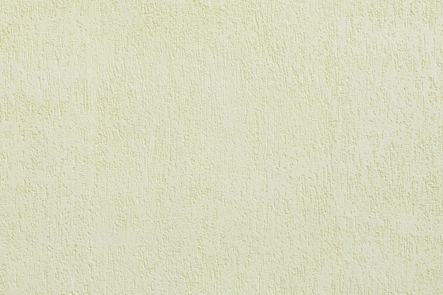 Textura de pared enlucida beige. Superficie transparente y fondo sólido abstracto. Estructura construida con paredes pintadas de color pálido