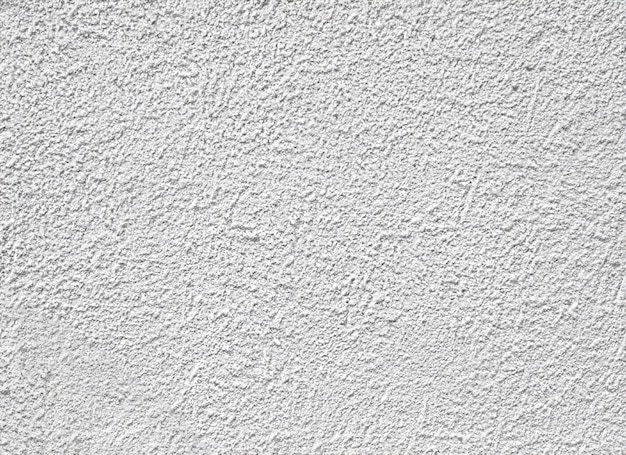 Textura de la pared enlucida con cemento blanco áspero