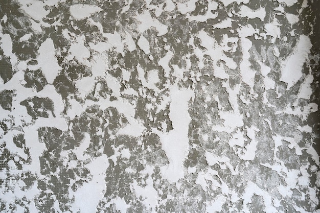 Foto textura de la pared de fondo gris moteado