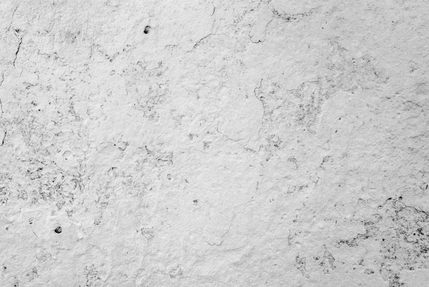 Textura, pared, fondo de hormigón. Fragmento de pared con rasguños y grietas.