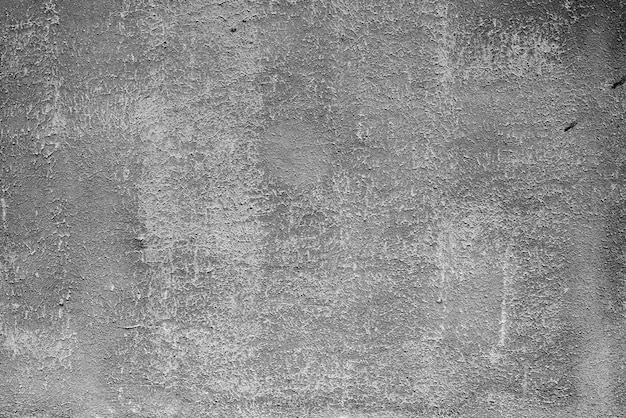 Textura, pared, fondo de hormigón. Fragmento de pared con rasguños y grietas.