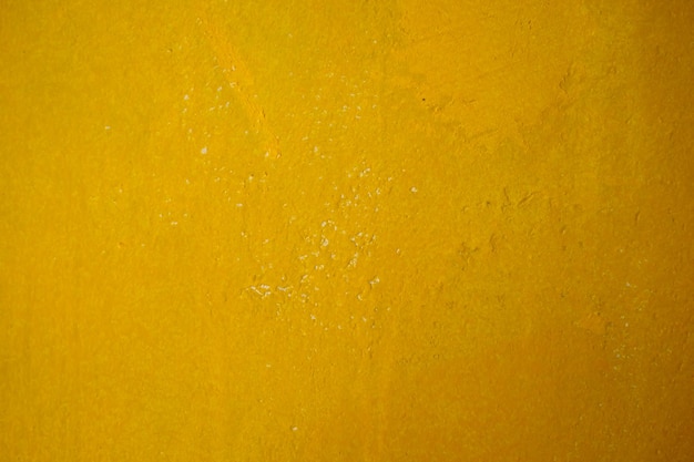 Textura de pared grunge brillante. Textura de fondo de pared de piedra vintage grunge con textura de cáscaras amarillas. Papel pintado de pared amarillo vintage. Pared de textura, fondo amarillo grunge.