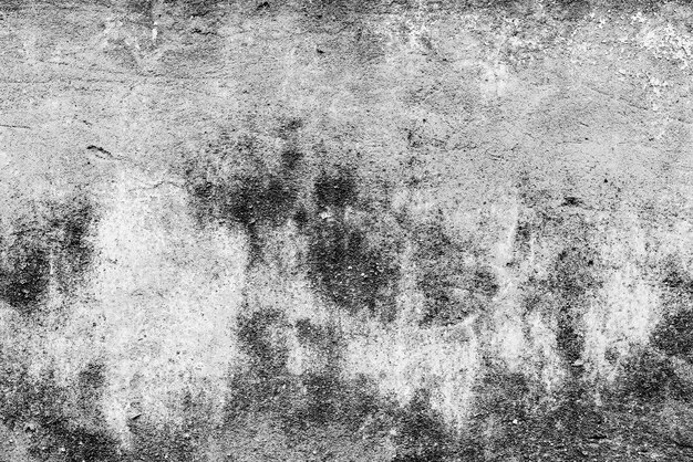 Textura, pared, hormigón. Fragmento de pared con arañazos y grietas.