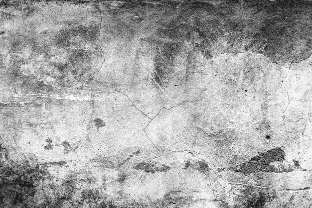 Textura, pared, hormigón. Fragmento de pared con arañazos y grietas.