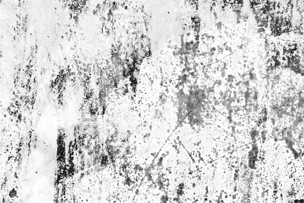 Textura de una pared de hormigón con grietas y arañazos que se pueden utilizar como fondo