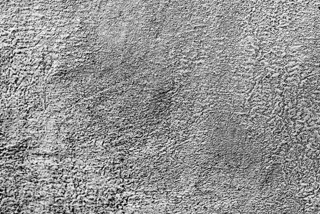 Textura, pared, hormigón, se puede utilizar como fondo. Fragmento de pared con rasguños y grietas.