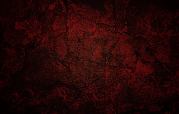 Textura de la pared de hormigón rojo agrietado