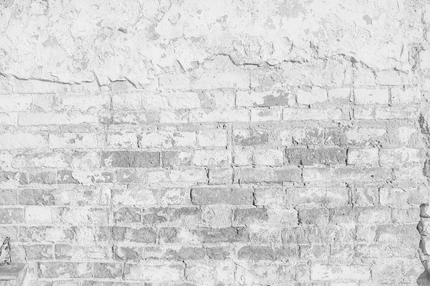 Foto textura de pared de ladrillo blanco / fondo abstracto blanco, edificio de pared de ladrillo vintage