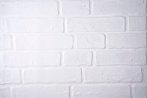 Textura de pared de ladrillo blanco moderno para el fondo