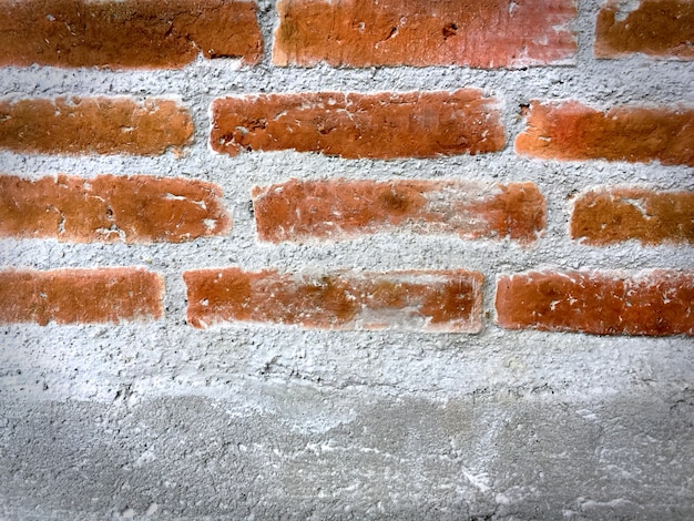 Textura de pared de ladrillo y cemento