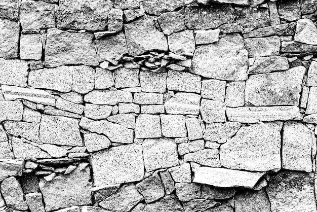 Textura de una pared de ladrillos con grietas y arañazos que se pueden utilizar como fondo