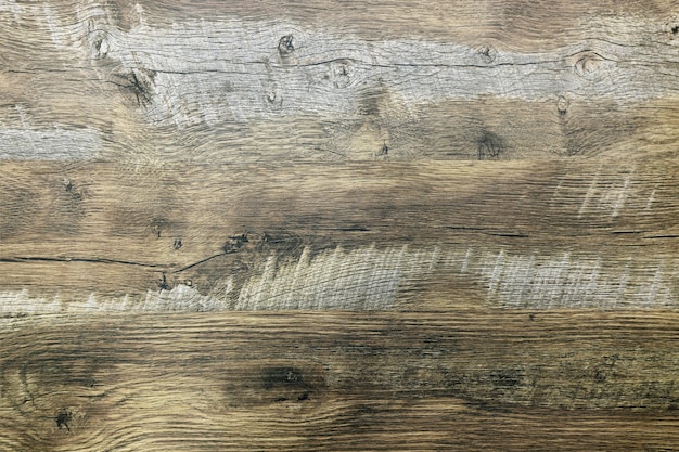 Textura de una pared de madera con manchas grises y blancas material de madera de fondo