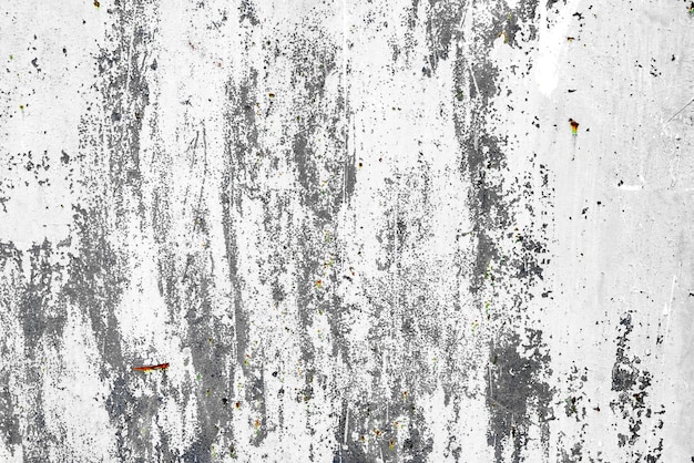 Foto textura de una pared de metal con grietas y arañazos que se pueden utilizar como fondo