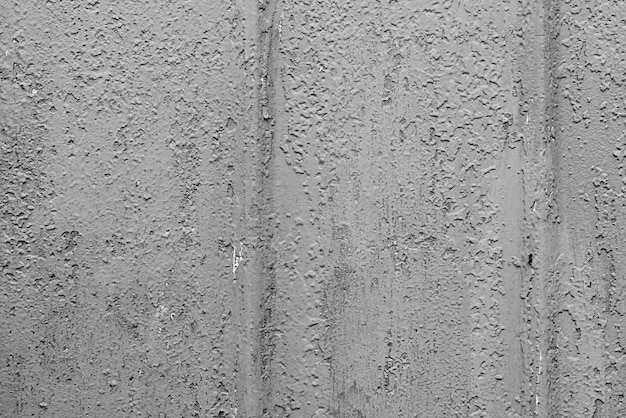Foto textura de una pared de metal con grietas y arañazos