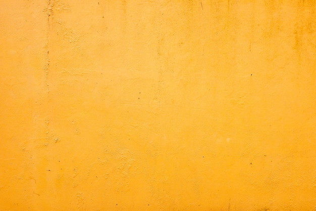La textura de la pared de piedra amarilla puede utilizarse como fondo
