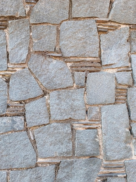 Textura de pared de piedra o roca de losa Material de construcción