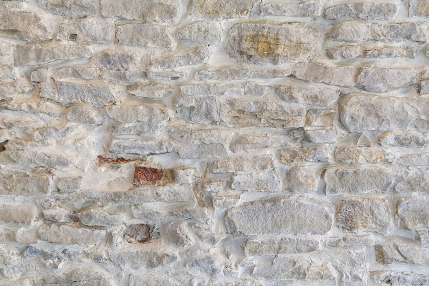 Textura de pared de stane castillo medieval, antiguo fondo de pared de piedra del castillo medieval.