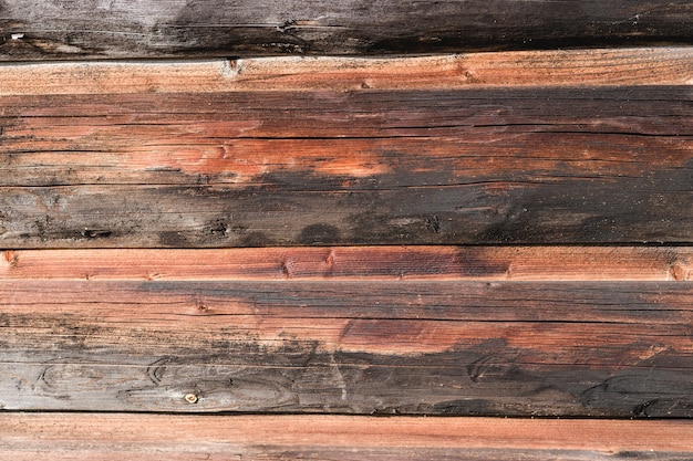 Textura de pared de tablón de madera marrón, uso natural para el fondo.