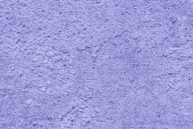 Textura de pared vieja violeta, color del año 2022 muy peri.