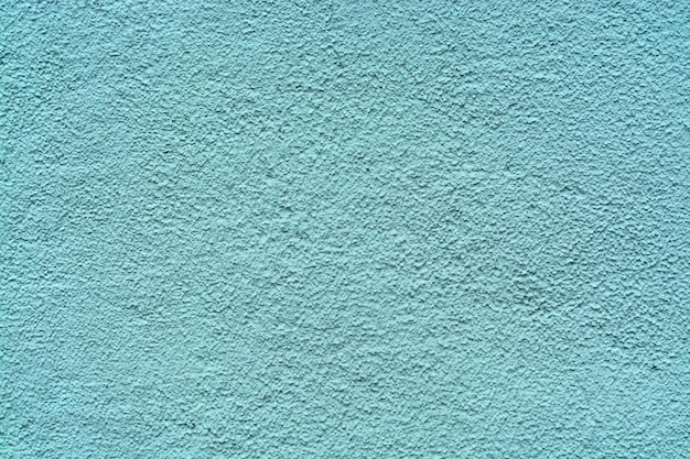 Textura de pared de yeso granulado turquesa