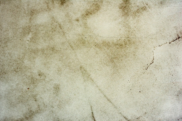 Textura, parede, fundo de concreto. Fragmento de parede com arranhões e rachaduras