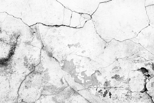 Textura, parede, fundo de concreto. Fragmento de parede com arranhões e rachaduras
