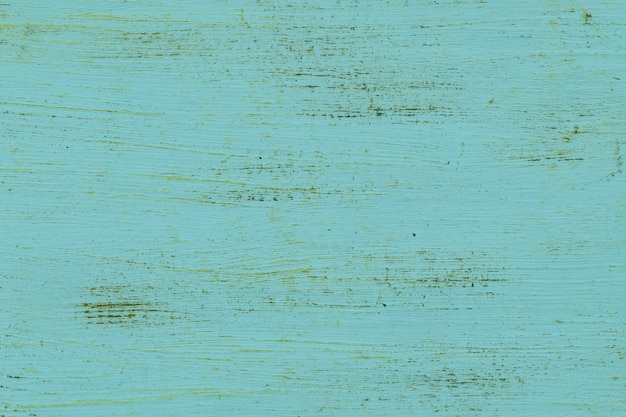 Textura de pátina verde sobre madera.