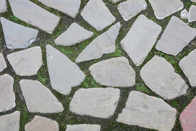 Textura y patrón de la pared de roca natural. Una superficie o estructura hecha de bloques de piedra.