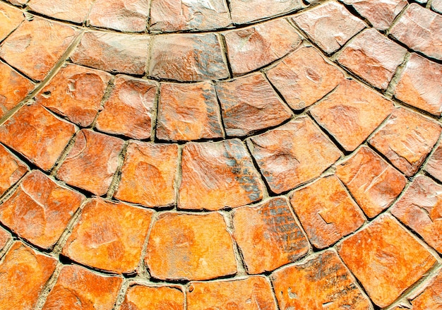 textura de pavimento de bloque de piedra naranja