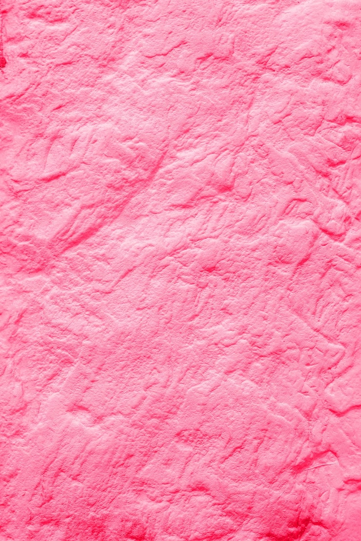 Foto textura de piedra áspera rosa. hermosa superficie natural.