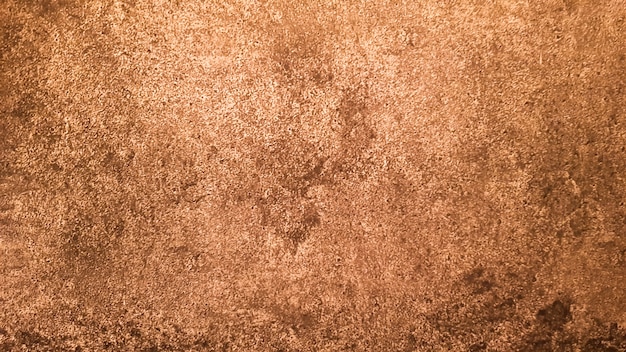 Foto textura de piedra de granito. fondo de piedra dorada marrón. vieja superficie de la pared de piedra vacía o antiguo fondo de textura de papel marrón sucio marrón o beige. grunge de oro marrón.
