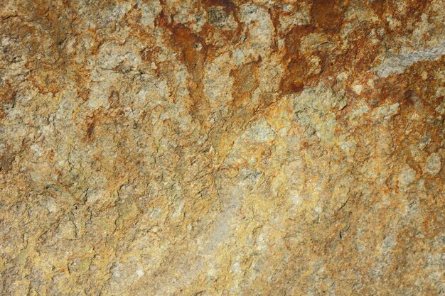 Textura de piedra de granito Pared de granito de piedra natural con estructura rugosa Fondo de granito