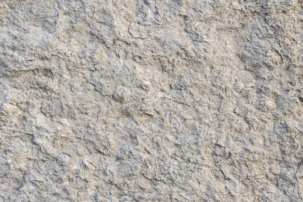 Textura de piedra gris en mal estado. Fondo de piedra