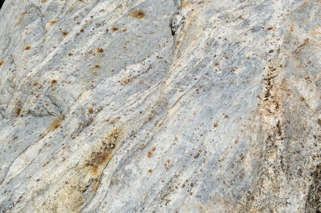 Textura de piedra marrón gris mineral natural tallada sólida fuerte áspera áspera áspera con textura afilada