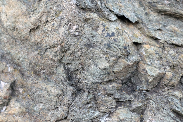 La textura de piedra de piedra o roca vieja en las montañas