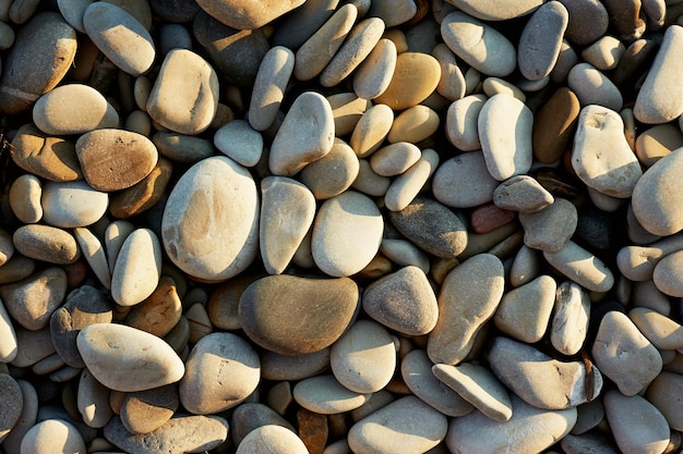 La textura de las piedras de los guijarros del mar al cierre