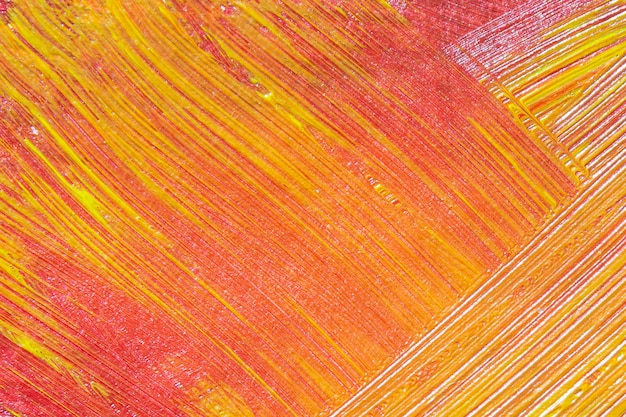 Foto textura de pintura acrílica rosa y amarilla.