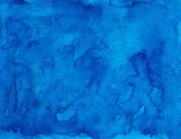 Textura de pintura de fondo líquido azul profundo acuarela. fondo acuarela pintada a mano. manchas celestes sobre papel.