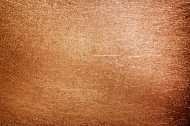Foto textura de placa de cobre, superficie de metal naranja cepillado