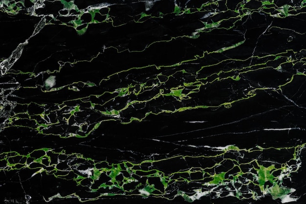 Textura de primer plano de superficie plana de mármol natural negro y verde