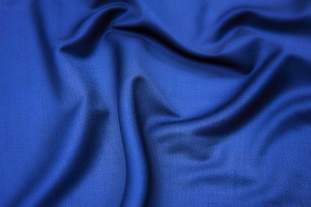 Foto textura de primer plano de tela o tela azul natural del mismo color textura de tela de seda de algodón natural o material textil de lana o lino fondo de lona azul