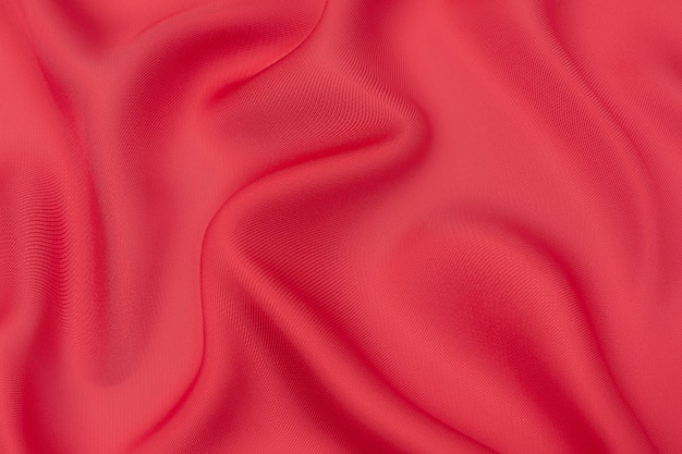 Textura de primer plano de tela o tela roja o rosa natural del mismo color Textura de tela de seda de algodón natural o material textil de lana o lino Fondo de lona roja y naranja